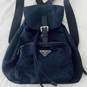 Vintage PRADA nylon/leather navy backpack. 13”X 12”